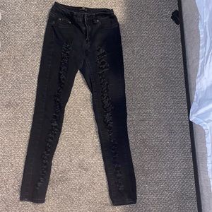 Low rise black ripped jeans